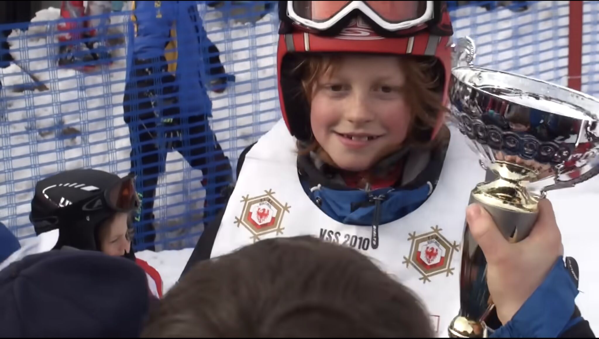 A young Jannik Sinner racing giant slalom skis